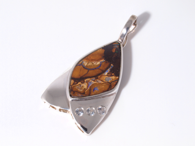 Custom silver opal jewelry handmade with an authentic Australian boulder opal