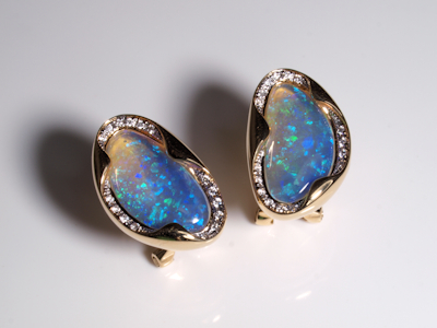 Sophisticated gold jewelry collection with fine crystal opals
