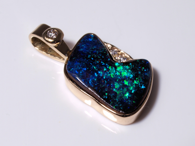 Rare opal jewelry featuring a precious Australian black opal with intense fire