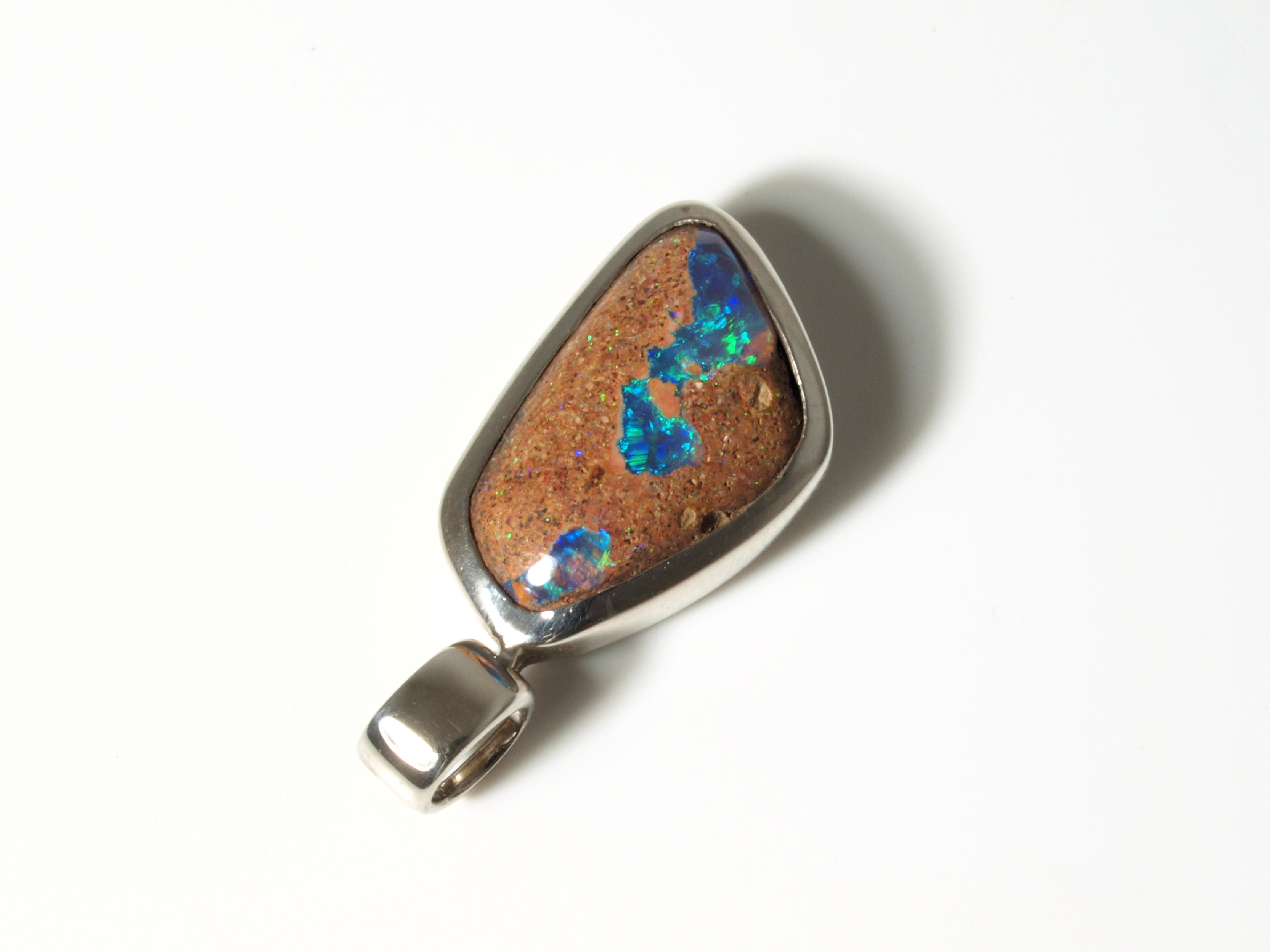 Exquisite sterling silver jewelry design with a genuine Australian opal