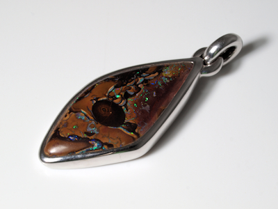 Artisan silver pendant showcasing a rare Australian Yowah nut opal
