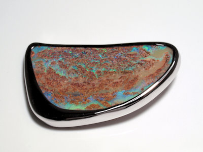 Natural opal from Australia beautifully set in a custom silver bezel setting